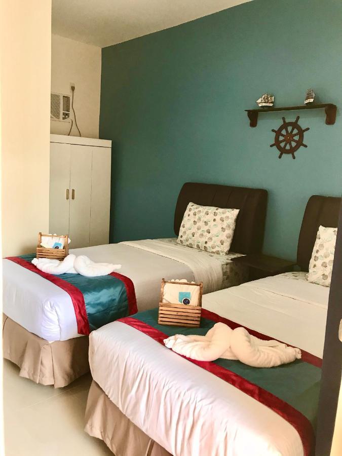 Anchorage Inn Moalboal Bagian luar foto