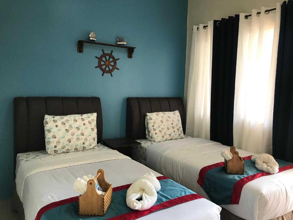 Anchorage Inn Moalboal Bagian luar foto